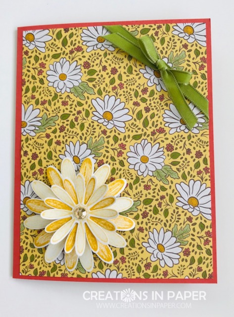 Designer Series Paper can be a great focal image for a card. The #ShopYourCraftStash With a Twist uses the beautiful daisy paper and a punched daisy for a simple card.