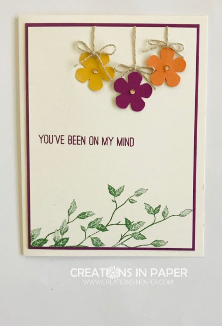 This card is a great Thinking of You idea. Take some punched flowers and stamped images and you have the Small Bloom Punch Clean and Simple Idea.