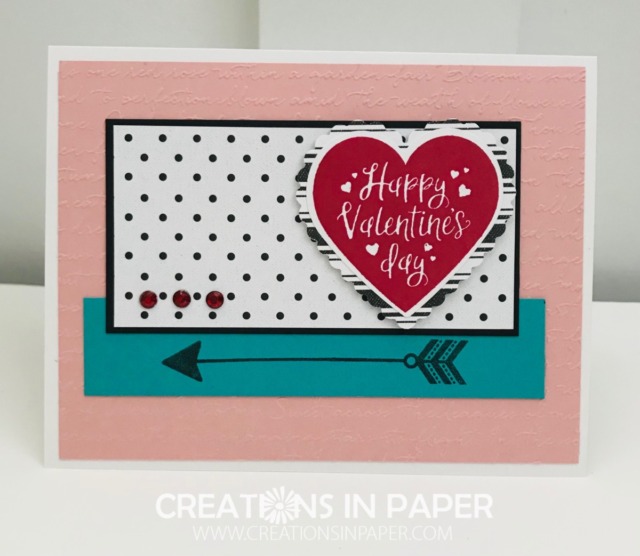 Doesn't that scripty background make this an elegant Valentine? I love the addition of the nontraditional color in with traditional ones to make this pretty Handmade Valentine Card Idea.