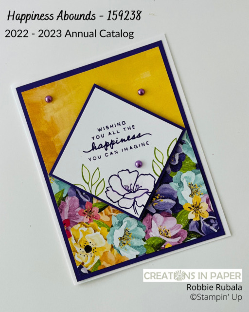 Look at how the stamped images are slightly colored.  It is a quick and easy technique.  Get the details for the Stampin' Up Happiness Abounds with a quick coloring technique card and order your supplies to make this card.