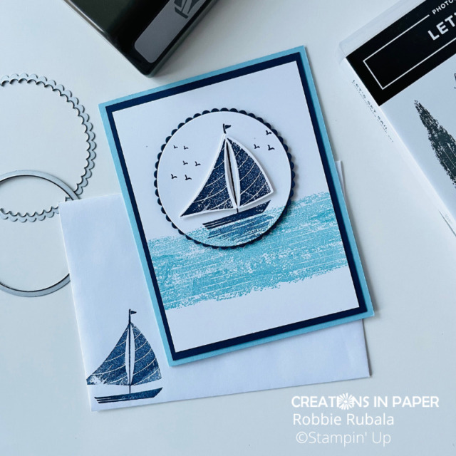 A blue sailboat on water masculine card made using the Let's Set Sail Stampin' Up! bundle. 