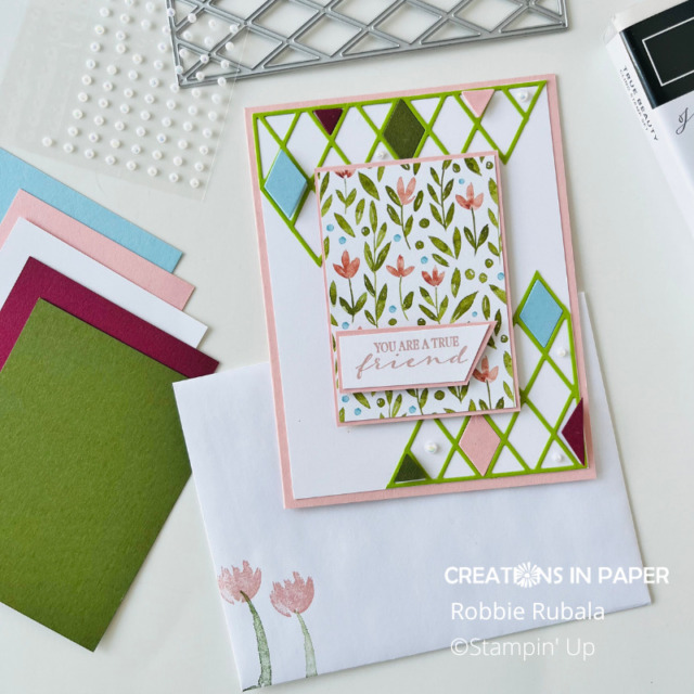 A fun card with a background created with a few snips of the die cut.  Adding colored diamonds and pearls add more interest to the background of the Stampin' Up True Beauty Friend creation.