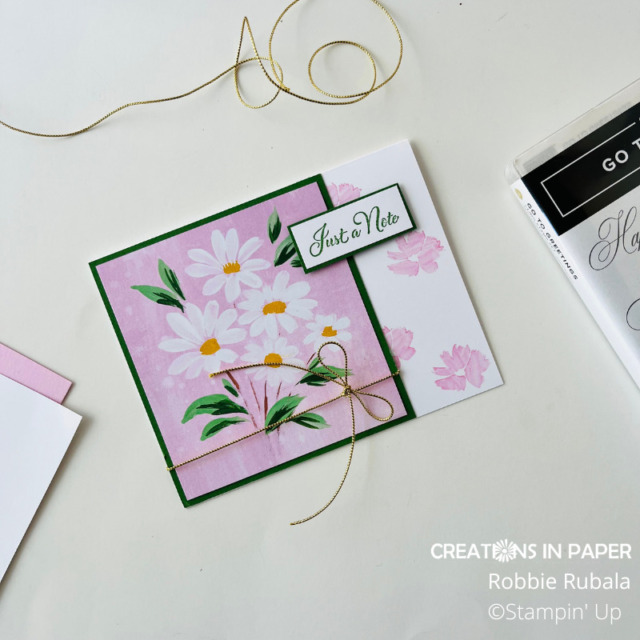 Look at that beautiful pink daisy panel.  The Fresh as a Daisy Note from Stampin' Up uses new pattern paper and a new core color.  click through to learn more.