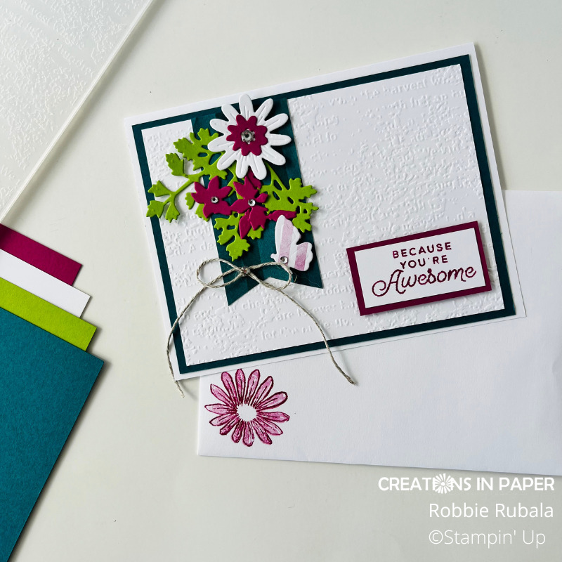 Combining die cuts for a card embellishment - Creations in Paper
