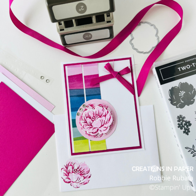 Cut my ribbon in half for a double loop bow.  Perfect embellishment for the Stampin' Up Berry Burst colorful idea.