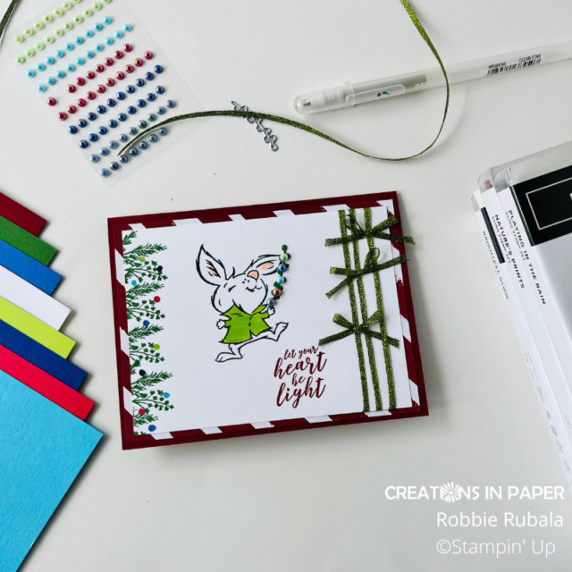 Look at this adorable idea!  Would you have used this stamp set to make a Christmas card?  See how to use Playing in the Rain for Christmas by clicking the photo.